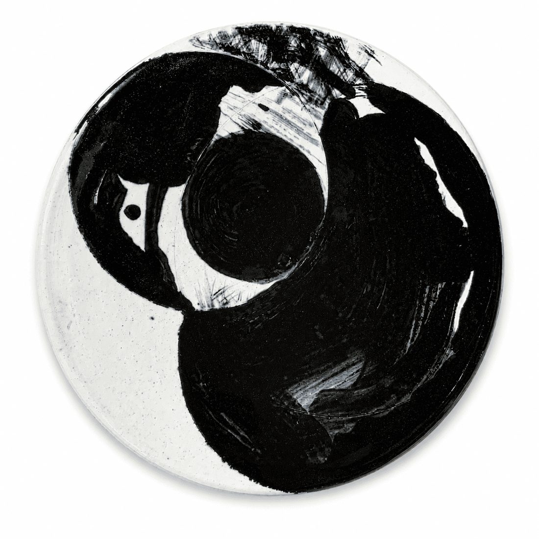 Assiette, spirale noire sur fond blanc